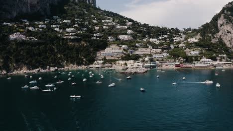 Aerial view of boats lining Capri, Italy&#039;s diverse shoreline