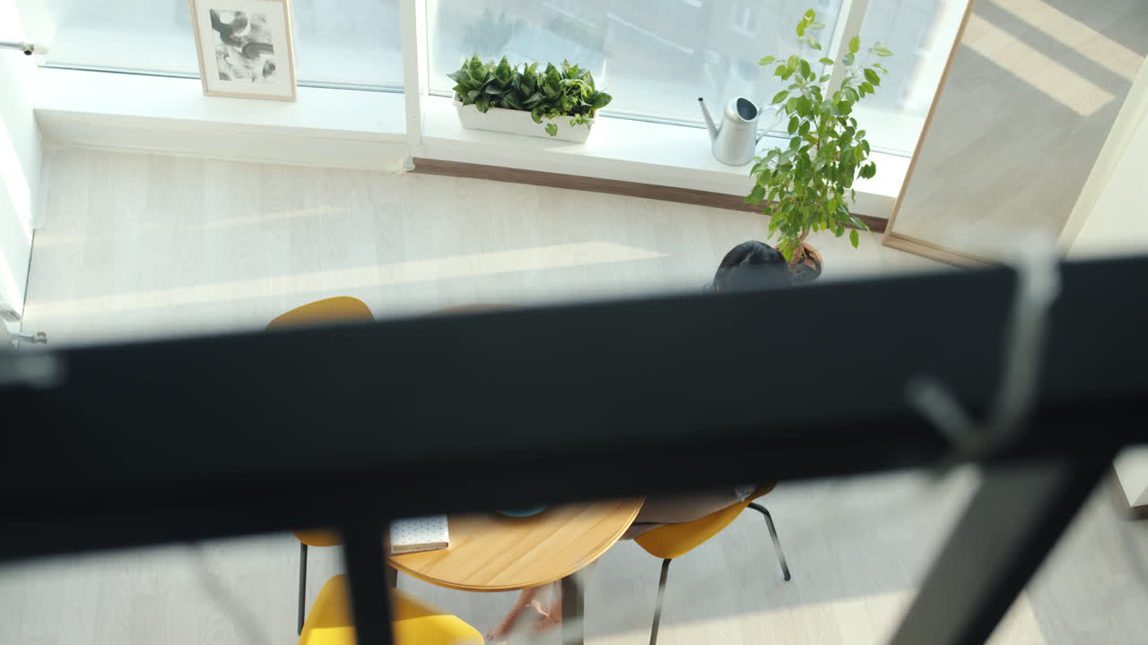 Couple enjoying breakfast in a bright modern home