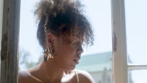 close-up view of fashionable african woman drinking lemonade