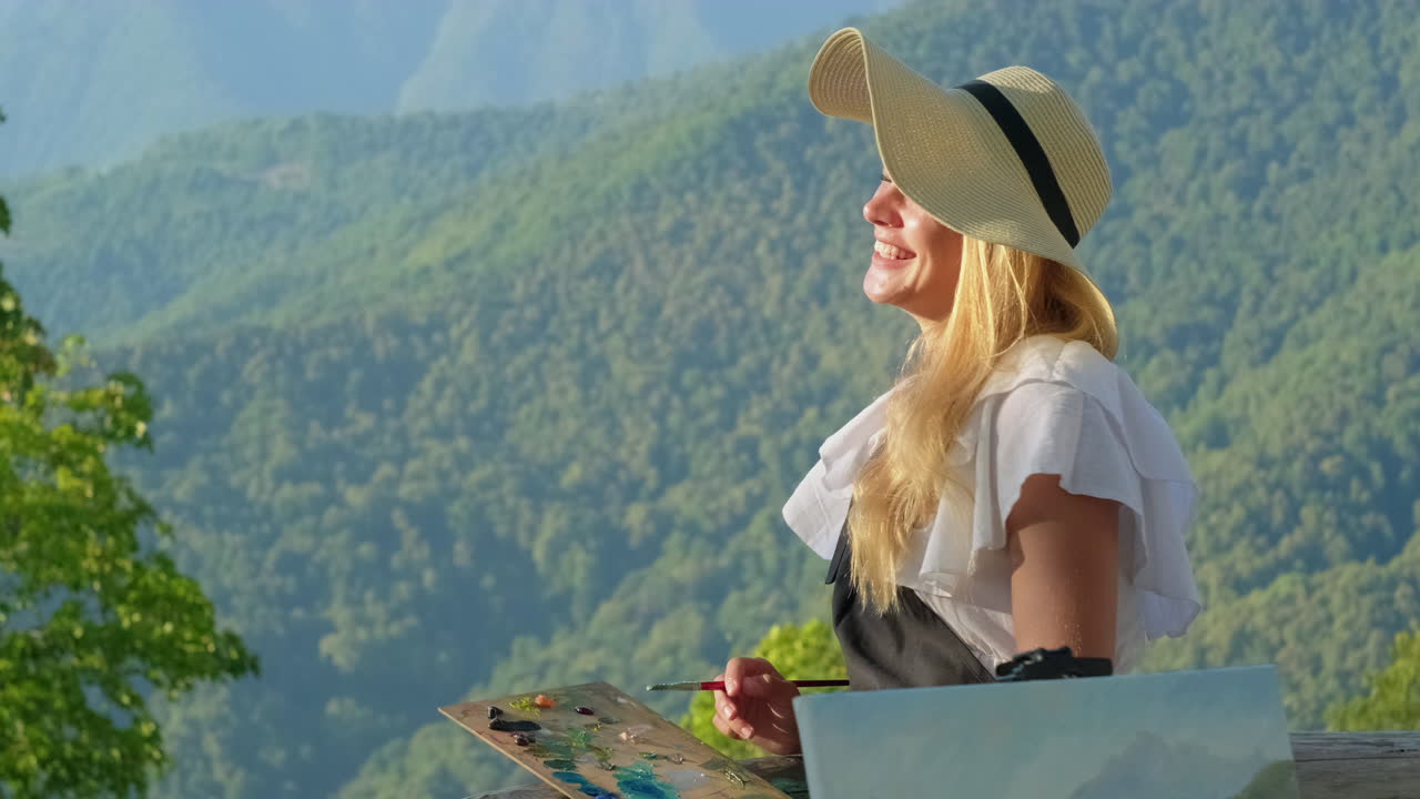 pintor en las montañas