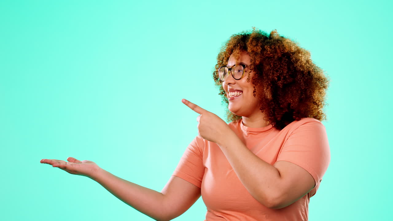 Face, pointing and black woman in studio