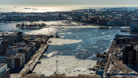 Time-lapse-of-ice-blocks-floating-in-front-of-the-city,-spring-day-in-Helsinki