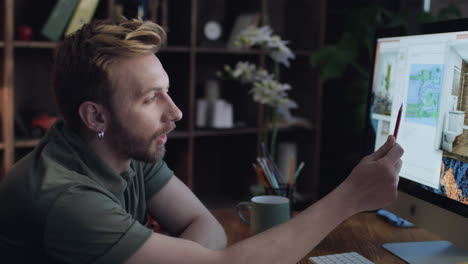 diseñador masculino creativo pensando ideas para el proyecto de decoración en el interior