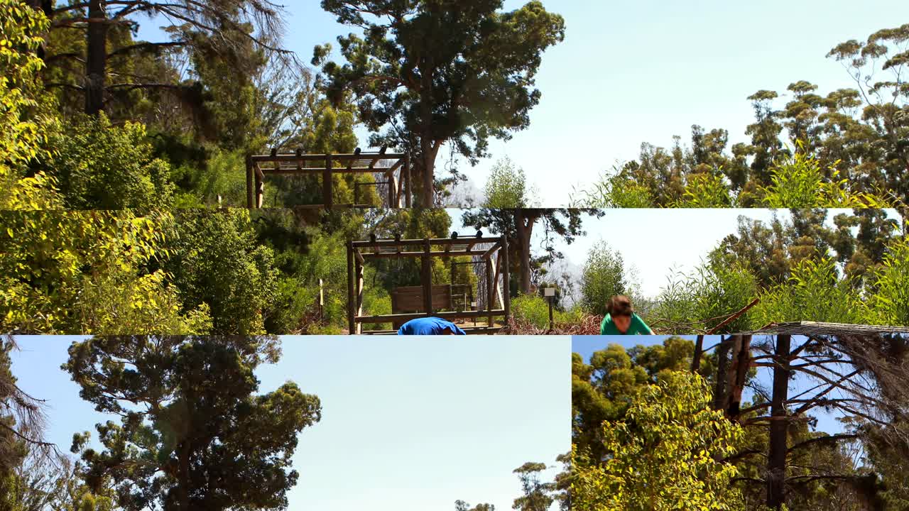 장애물 코스 도중 그물  ⁇ 으로 기어 다니는 아이들