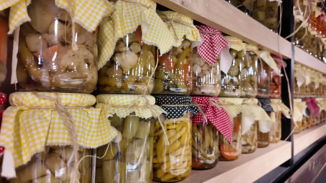 Rows of Pickled Vegetables in Jars