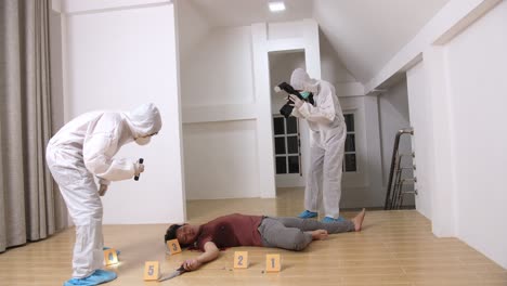 criminological expert collecting evidence at the crime scene