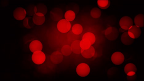 digital abstract animation red crimson bokeh blurred lights moving on black background