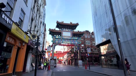 london chinatown gate with red lanterns on an empty street