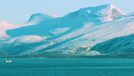 cinematic shot of a fishing boat in a fjord in norway