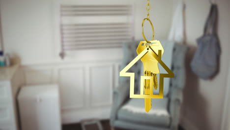 golden house keys hanging against interior of modern living room in background