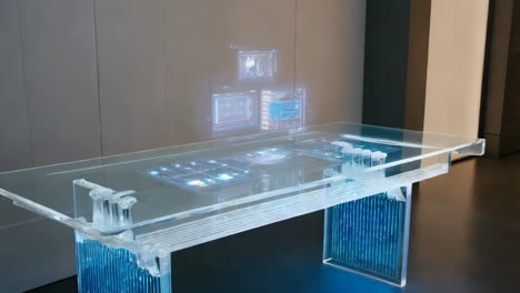 futuristic transparent table with holographic projections