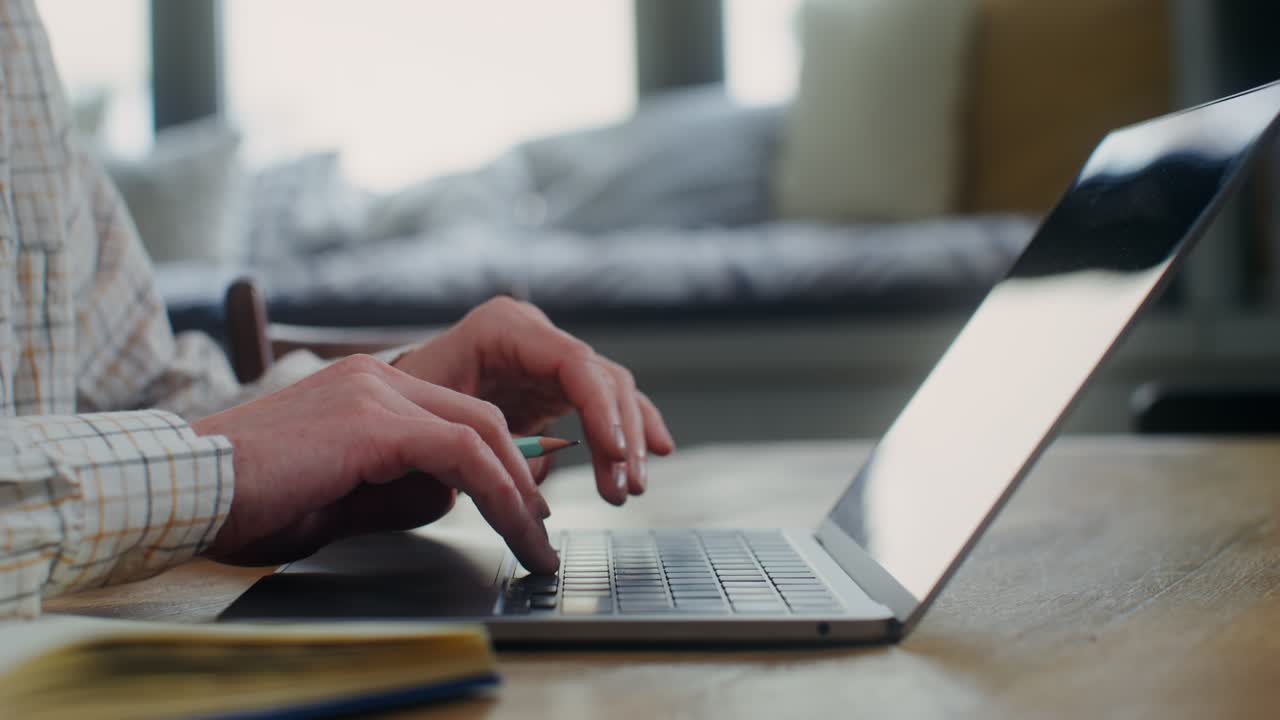 Person working on a laptop