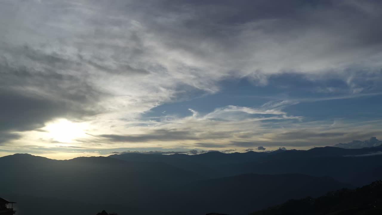 Kanchenjunga mountain is visible in the distance