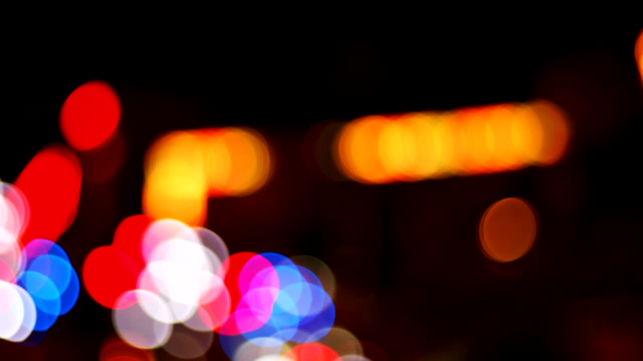 parque de atracciones bokeh por la noche