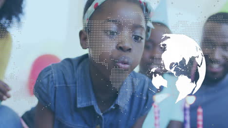 blowing candles, girl with world map animation overlay in school setting