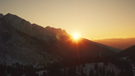 picturesque warm sunset over italian alps in wintertime