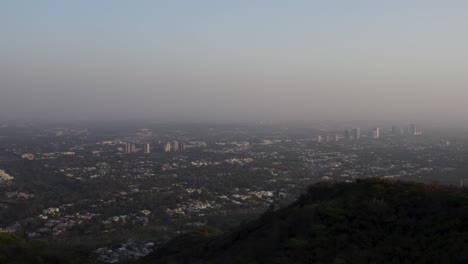 evening view of islamabad's skyline and urban sprawl from the elevated margalla hills. islamabad