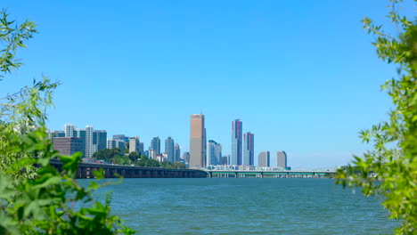 cityscape above the river with mild wind under blusky