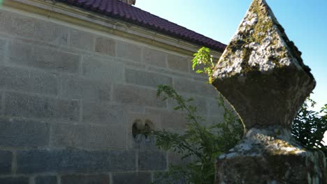 side angle of santa maría de parada de outeiro church in vilar de santos, galicia, spain