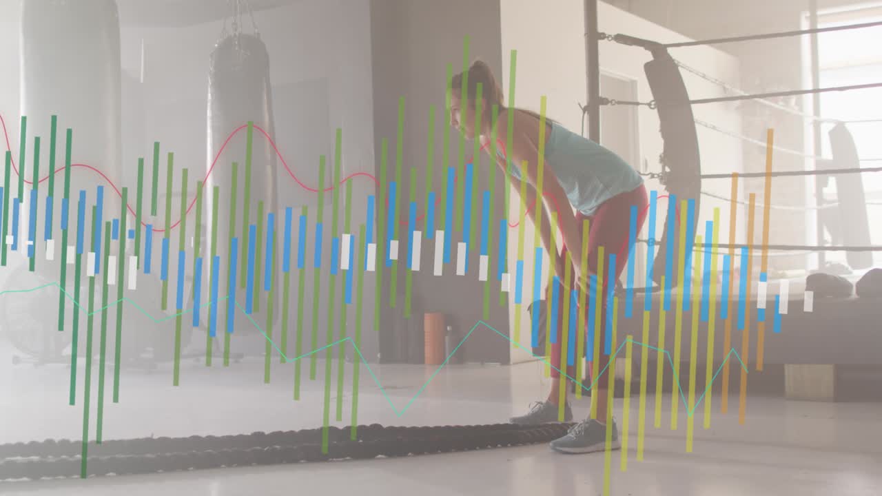 Woman starting battle rope waves in gym animated bars and waveform overlaying left, gaining power