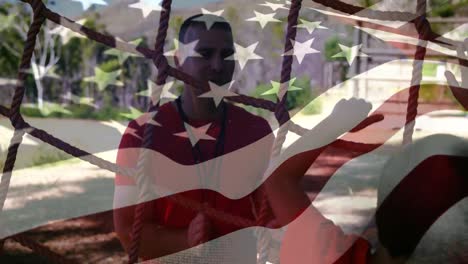 Animation-of-flag-of-usa-over-caucasian-man-and-boy-during-obstacle-race-training