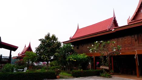 beautiful wooden architecture surrounded by lush greenery