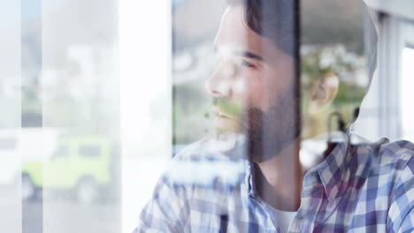 Young-man-sitting-in-restaurant