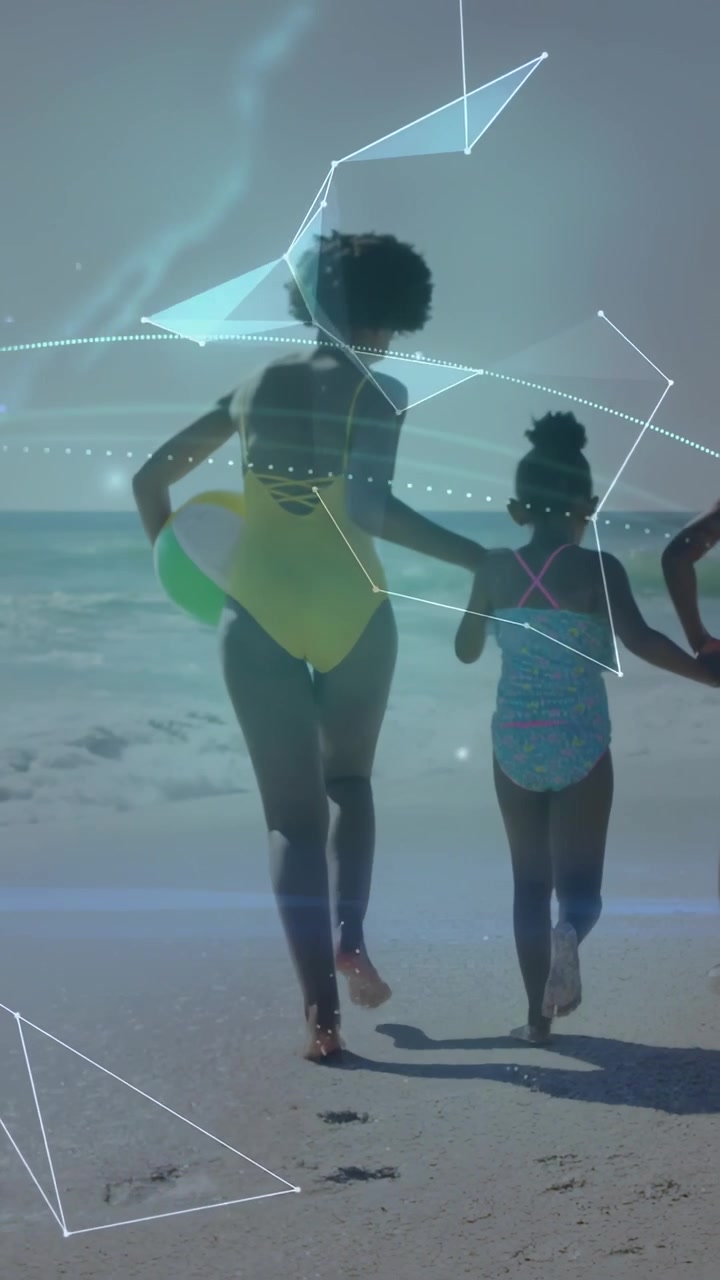 Vertical video: Mom and girl holding hands, running to surf while tech overlay forming around them