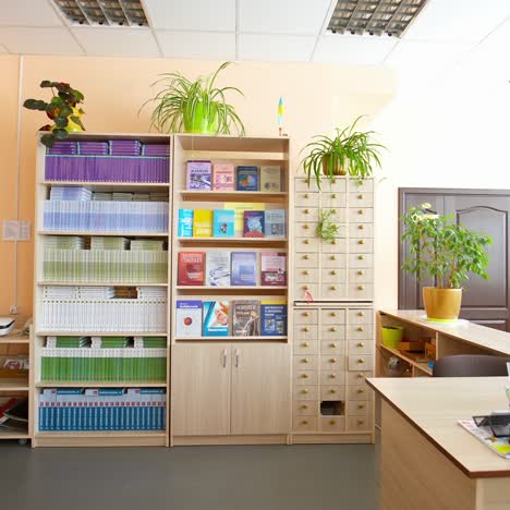 books on bookshelf in library. interior of the library with shelves full of books