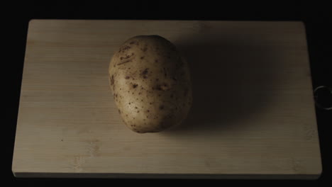 slow-mo of potato with moving lights