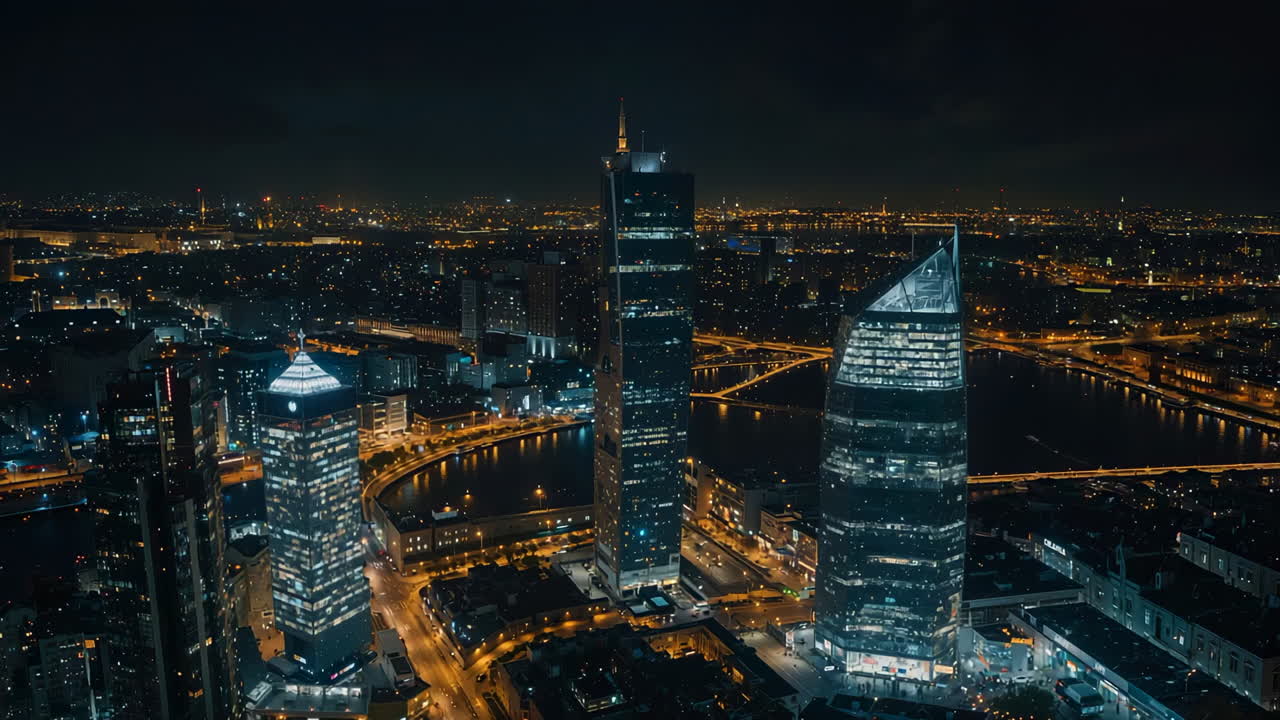 Panoramic Night View of a Modern City with Skyscrapers and River