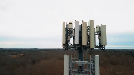 aerial shot flying toward cell phone tower