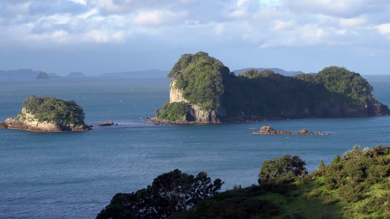 Sunny green islets near Cathedral Cove