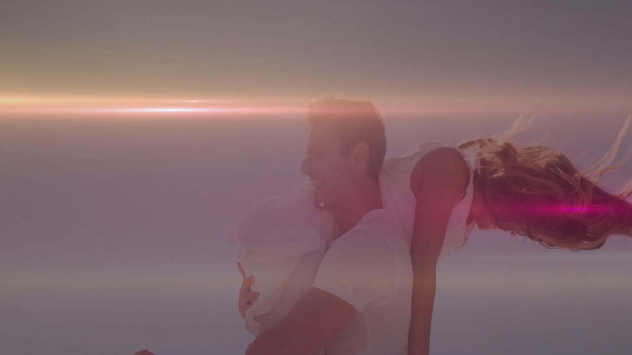 Carrying woman on shoulders, man surrounded by colorful animation light streaks