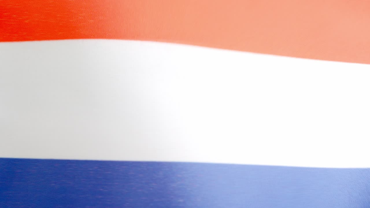 Dutch national flag waving by the wind
