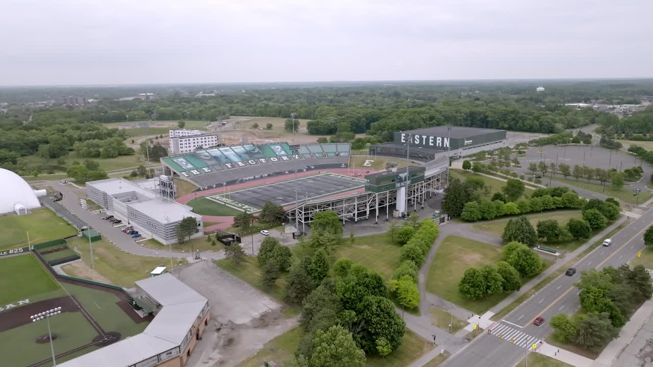 Eastern Michigan University football stadium in Ypsilanti, Michigan with drone video moving up