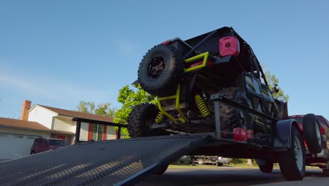 utv driving on a trailer