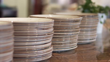 stack of the plates are waiting to be served in the restaurant