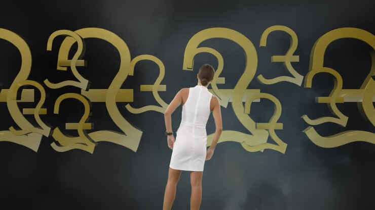 Businesswoman looking an animation of pound sterling