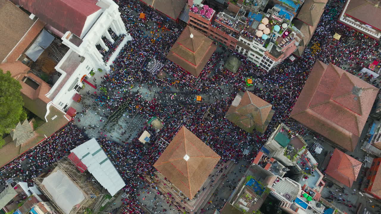 People run in crowds at Indra Jatra Festival at Basantapur Durbar Square, Kathmandu Nepal