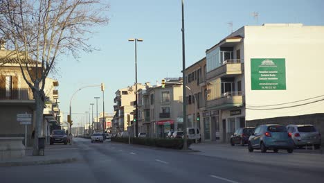 city street scene with buildings and traffic