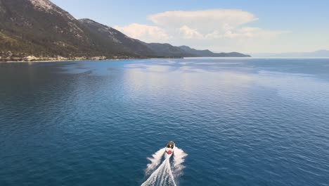 boat racing across lake tahoe near sand harbor nevada