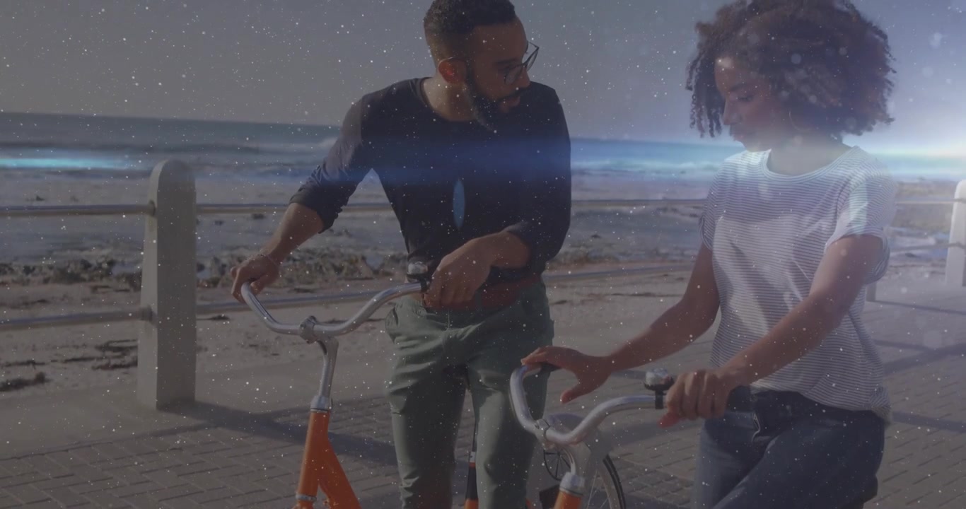 Woman and male bicyclists adjusting handlebars and gesturing toward path, starting travel cycling