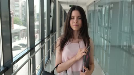 young-girl-walks-around-the-business-center