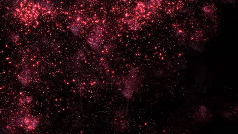 un fondo negro con brillos rojos