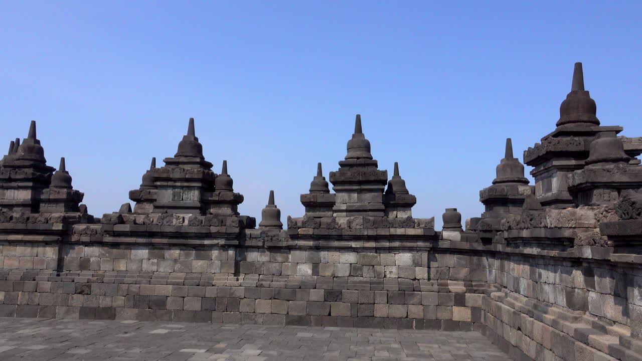 Stone sculptures with religious significance at Borobudur Temple.