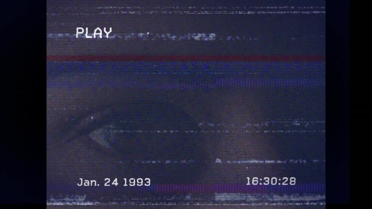 Vhs glitch camera effect over close up of a female eye