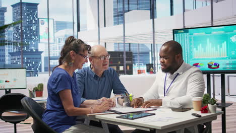 senior citizens consulting a financial planner about retirement planning