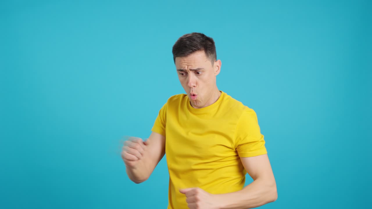 Man showing various emotions in front of a blue background