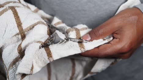 drying dishes with a towel